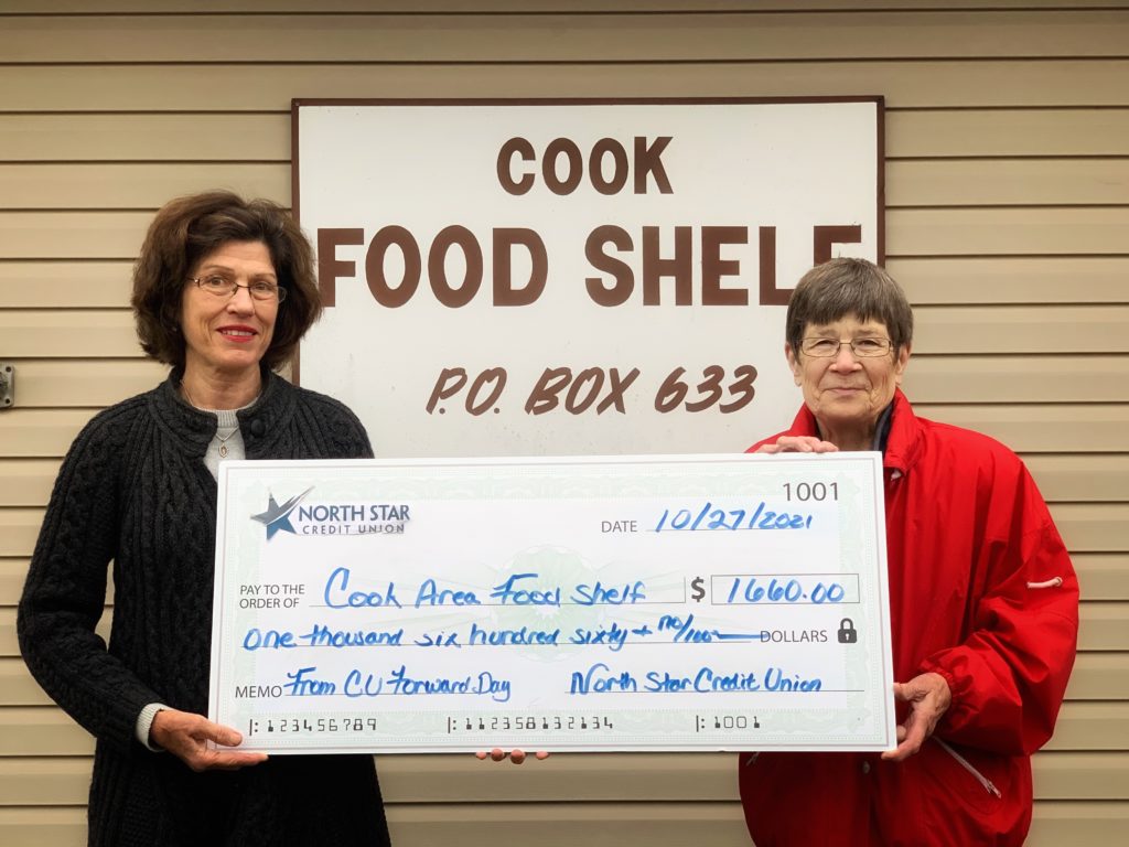 North Star Credit Union donates to Cook Food Shelf